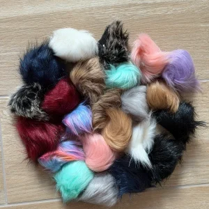 Set di 23 pompon in pelliccia sintetica